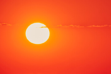 Wall Mural - The clear sky was filled with a beautiful orange sunset.