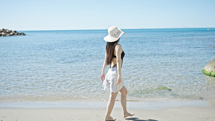 Sticker - Young chinese woman tourist wearing swimsuit and summer hat at seaside