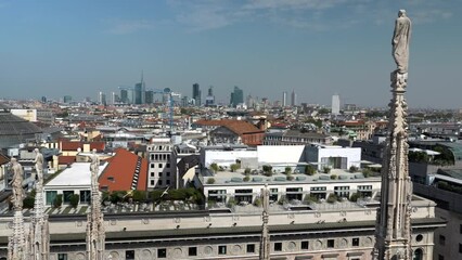 Wall Mural - Milan cityscape seen from the historic Duomo Cathedral in Milan, Lombardy, Italy.