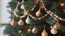 Sustainable Christmas Trees Eco-friendly Ethical Decorations. Natural Wooden Beads Garland On Christmas Tree. Eco Friendly Zero Waste Christmas Tree Decor