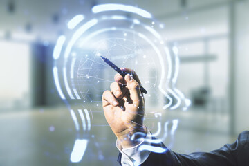 Poster - Man hand with pen working with abstract virtual artificial Intelligence interface with human head hologram on blurred office background. Multiexposure
