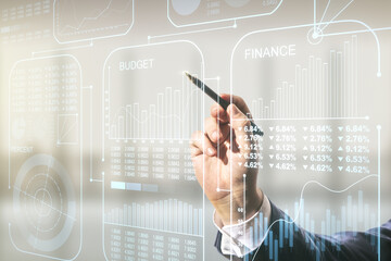 Poster - Multi exposure of male hand with pen working with stats data illustration on blurred office background, computing and analytics concept