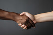 Black and caucasian hands holding each other in tolerance and anti racism concept. Generative AI