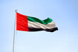 UAE flag waving atop of its pole