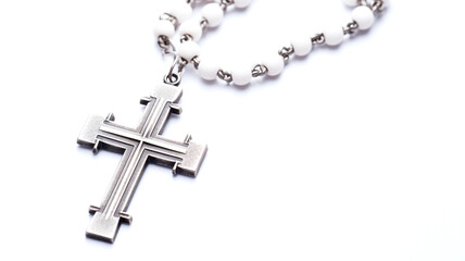 Experience the spirituality in a close-up of a person's hands holding a cross necklace, a powerful symbol of belief.