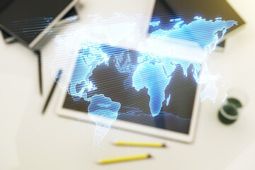 Poster - Multi exposure of abstract creative digital world map and modern digital tablet on background, top view, tourism and traveling concept