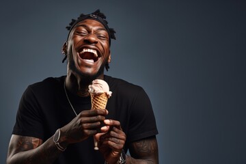 Wall Mural - Young man with neck and face tattoos eating ice cream