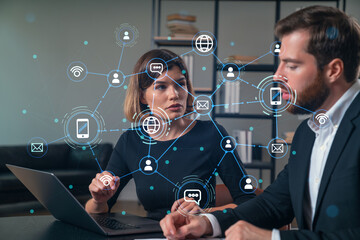 Wall Mural - thoughtful businesspeople typing on laptop at office workplace. concept of team work, business educa