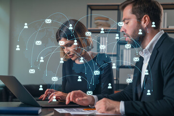 Wall Mural - thoughtful businesspeople typing on laptop at office workplace. concept of team work, business educa