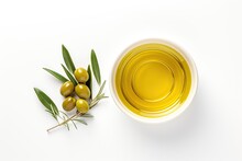 Top View Of A Small Bowl On A White Background With Olive Oil And Olives Flat Lay