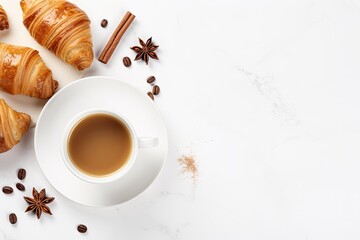 Sticker - Top view of a croissant and a cup of chai tea creatively arranged on a white background