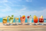 Fototapeta  - assorted summer cocktails on a wooden table with a beautiful beach setting. generative ai