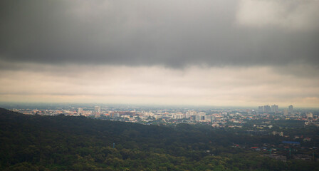 Wall Mural - Dramatic cloudscape over the city of Chiang Mai, Thailand