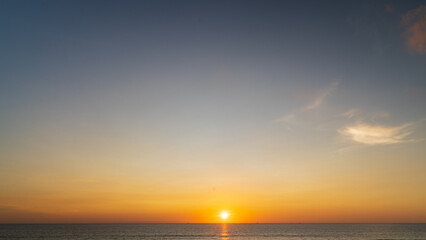 Wall Mural - abstract amazing scene of stuning colorful sunset or sunrise with clouds background in nature and tr