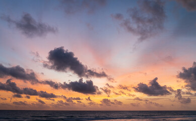 Wall Mural - abstract amazing scene of stuning colorful sunset or sunrise with clouds background in nature and tr