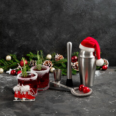 Wall Mural - Red christmas cocktail with cranberries in a glasses.