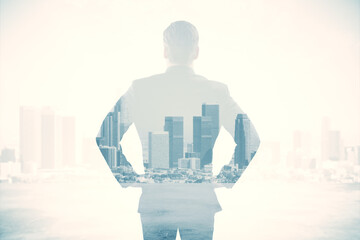 Canvas Print - Back view of young male standing on white bright city background with mock up place. Future, success and career concept. Double exposure.