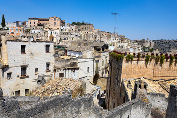 Wall Mural - MATERA, ITALY, JULY 18, 2022 - Wide panoramic view of the stones of Matera, 