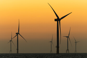 Sticker - Sunset view of the Offshore wind power systems off the western coast of Taiwan.