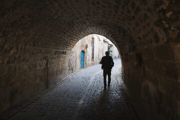 Wall Mural - person in the tunnel