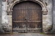 © altitudevisual - aged wooden church door with iron hinges