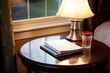 cd of church sermons on a bedside table