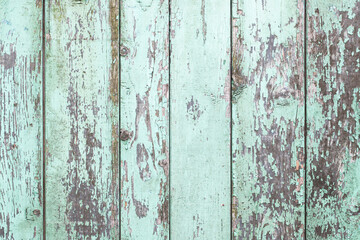 Wall Mural - Vertical wooden desk peeling paint. Old peeling paint texture. Grunge cracked wall background. Blue color weathered surface. Broken wood structure. Vintage pattern design.