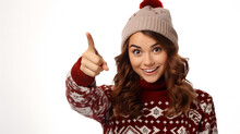 On White Background, A Beautiful Woman In Christmas Clothes Points Away On Copy Space