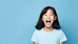 © ant - Teenager smiling stand isolated on pastel color background studio.