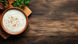 Yogurt soup on a wooden table, flat lay, traditional thick soup made from the best dairy products, a dish of traditional cuisine of Turkey and Turkic peoples. Idea for menu with copy space for text