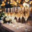 Glasses of champagne on a table at a wedding reception. Selective focus.