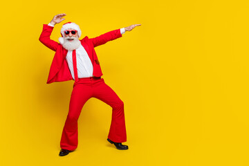 Wall Mural - Full size portrait of overjoyed excited person dance make moves newyear event isolated on yellow color backgorund