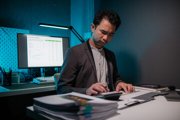 Poster - Businessman calculating business balance prepare tax reduction. Tax deduction planning concept.