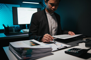 Poster - Businessman calculating business balance prepare tax reduction. Tax deduction planning concept.
