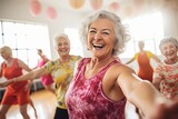 Old women enjoying zumba dance class.	
