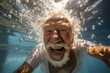 silver-haired man with a snowy beard, submerged underwater