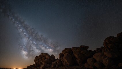 Wall Mural - A Rocky Landscape With A Star Filled Sky