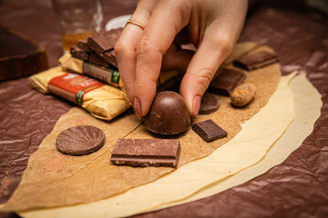 holding chocolate candy