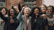 © MPA STUDIO - Diverse group of joyful women of different ages and ethnicities raising their fists in unity and celebration. Embodying the spirit of empowerment, togetherness, collective strength, confidence, pride