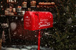 © pigwastudio - A red vintage Christmas post box for letters to Santa Claus outside on a snowy day