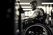 An athletic man with quadriplegia lies on a specialized adaptive sports chair, his hands tightly gripping the handles. Despite being paralyzed, he competes in wheelchair rugby, using his