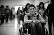 The teenager in the wheelchair sat in the school cafeteria, surrounded by friends. Despite his quadriplegia, he was a popular and outgoing student, excelling in his studies and inspiring