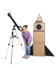 Sticker - Cute little girl with telescope and cardboard rocket on white background