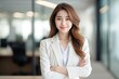© AI Farm - Beautiful Asian business woman smile in modern office. Smart and confident . Generative AI