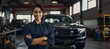 Confident South American female car mechanic in a garage background, professional automobile assistance photography, Horizontal format 9:4