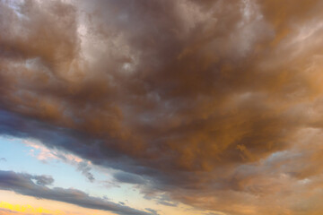 partly cloudy sky low angle view. dramatic clouds at sunset or sunrise