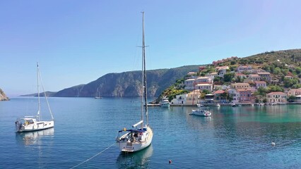 Wall Mural - Vacation in Greece sea view. Boats and yachts in Assos village lagoon, Kefalonia