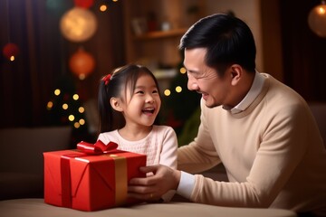Father days, daughter giving gift to father 