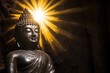a buddha statue enlightened by selective sunlight