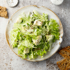 Wall Mural - Healthy leaf salad with avocado and seeds